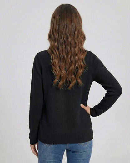 Back view of a woman wearing the Noiré Sweater by Lauven, a stylish black V neck sweater with button detail.
