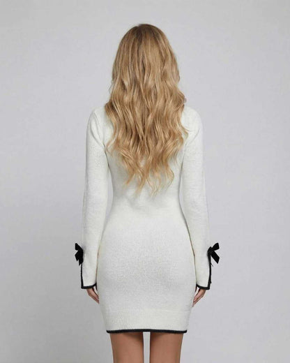 Monaco Mini Dress by Lauven, featuring long sleeves, bow detail, and a sleek silhouette in white.
