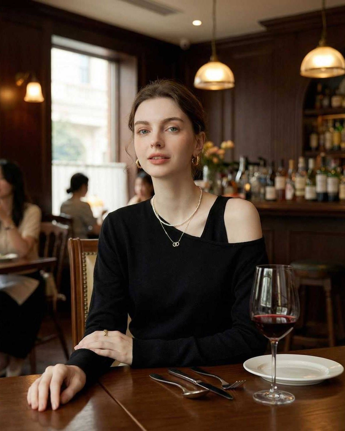 Monaco Pullover - Black Off Shoulder Pullover by Lauven, showcasing modern style with asymmetric knit detail in a chic setting.