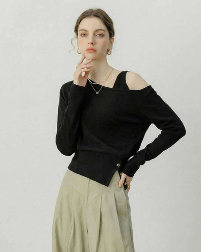 Monaco Pullover by Lauven – Black Off Shoulder Pullover with Asymmetric Knit Detail in a stylish setting.
