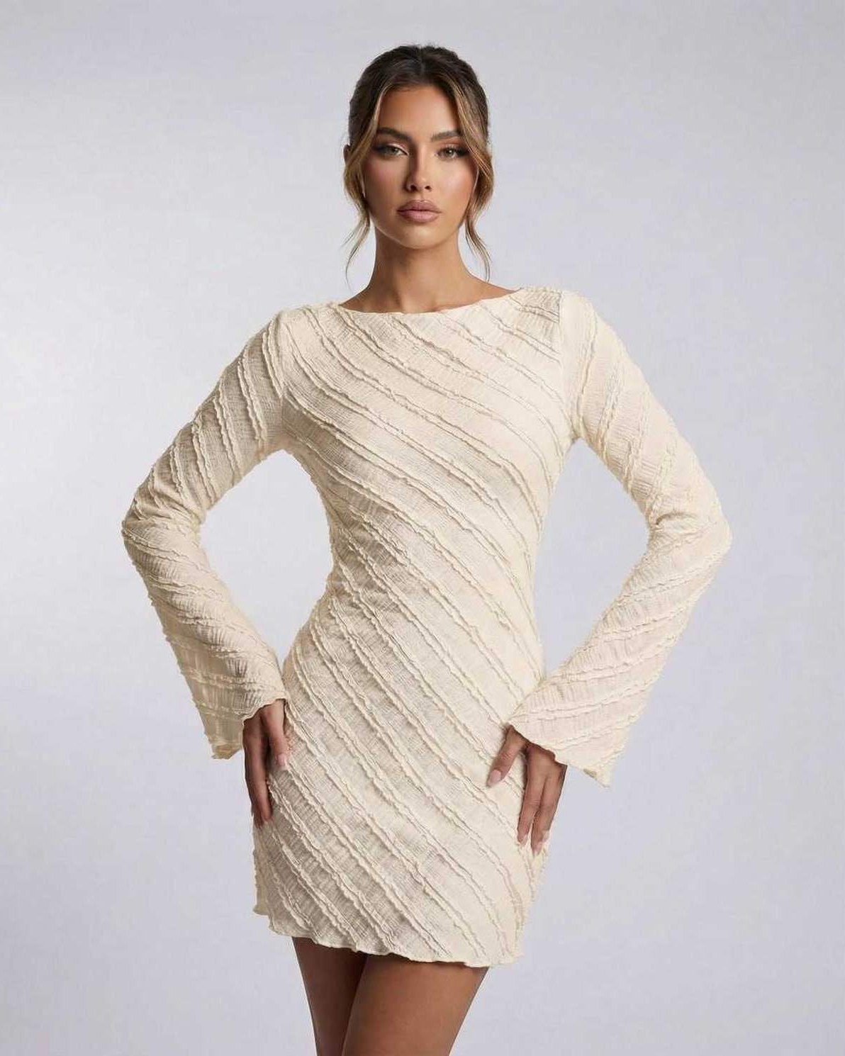Aurora Mini Dress by Lauven, cream long sleeve A-line mini dress with textured finish and modern boat neck.
