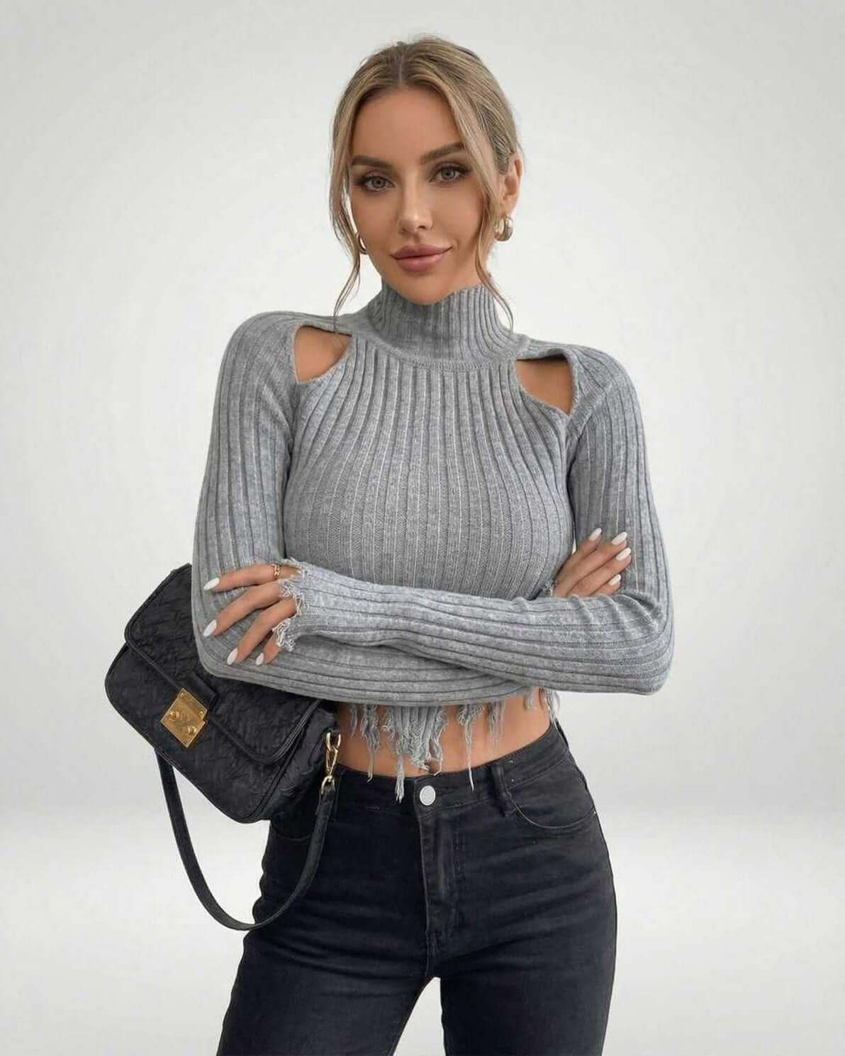Vega Sweater by Lauven – Women’s ribbed knit turtleneck sweater featuring modern cutout design.