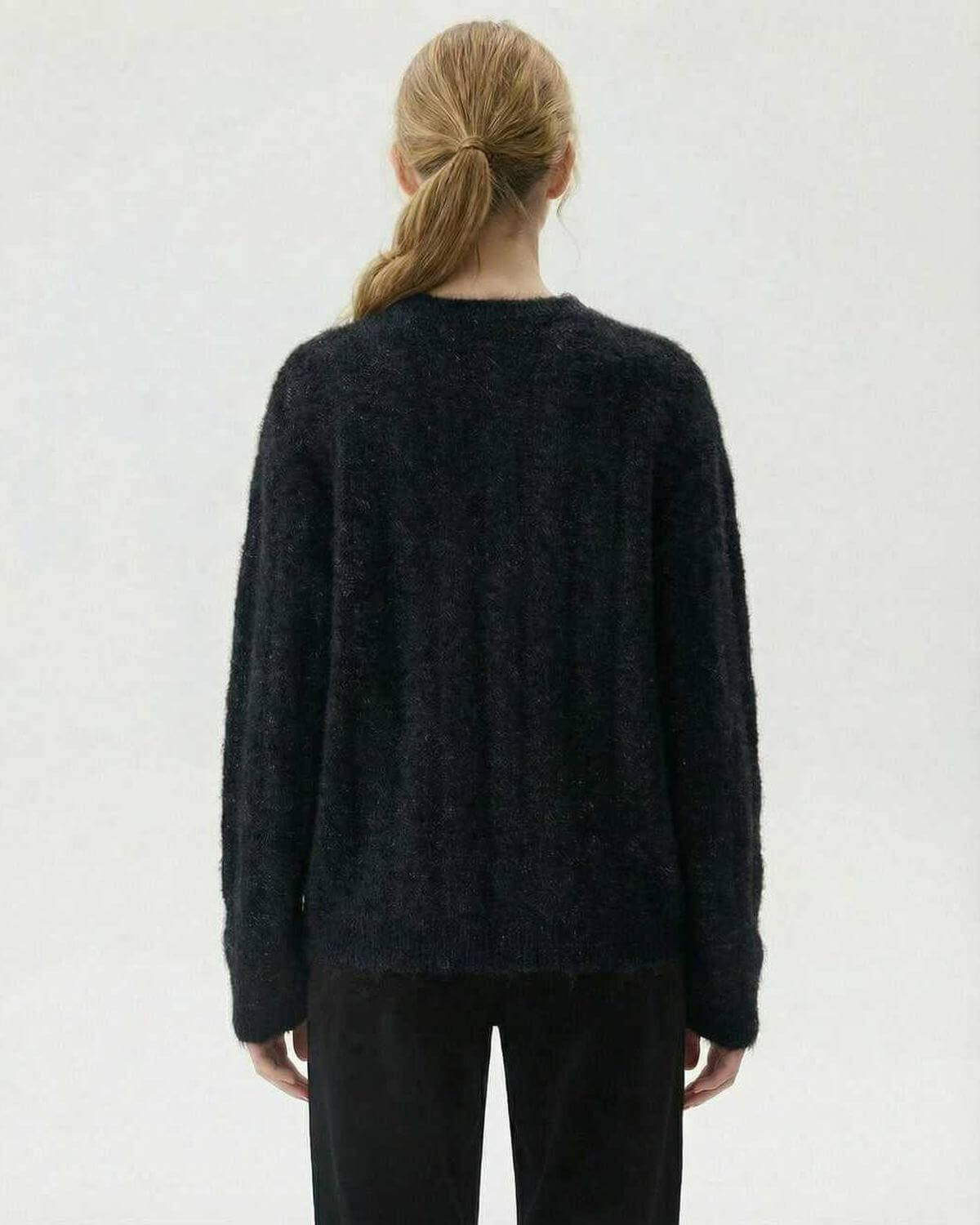Noiré Pullover by Lauven – Women's black wool blend knit sweater seen from the back.