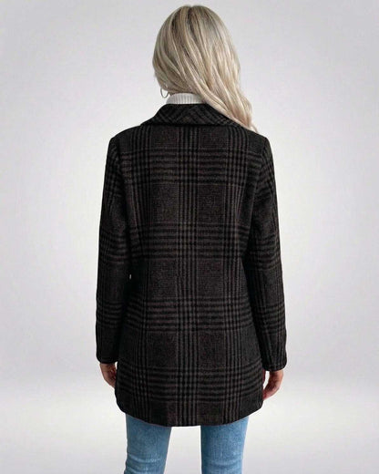 Back view of a woman wearing Noiré Jacket by Lauven, featuring a black plaid design and slim tailored fit.