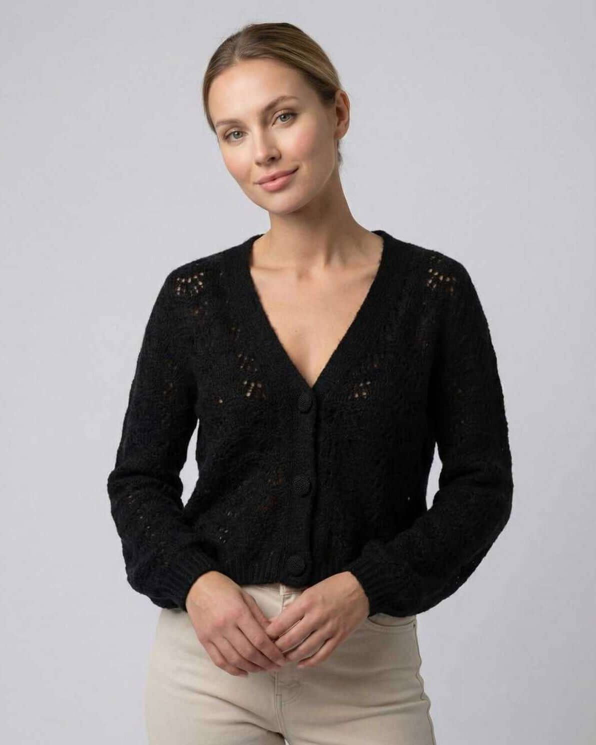 Monaco Cardigan by Lauven – Women’s black cardigan sweater with V-neck and hollow out knit, perfect for modern layering.
