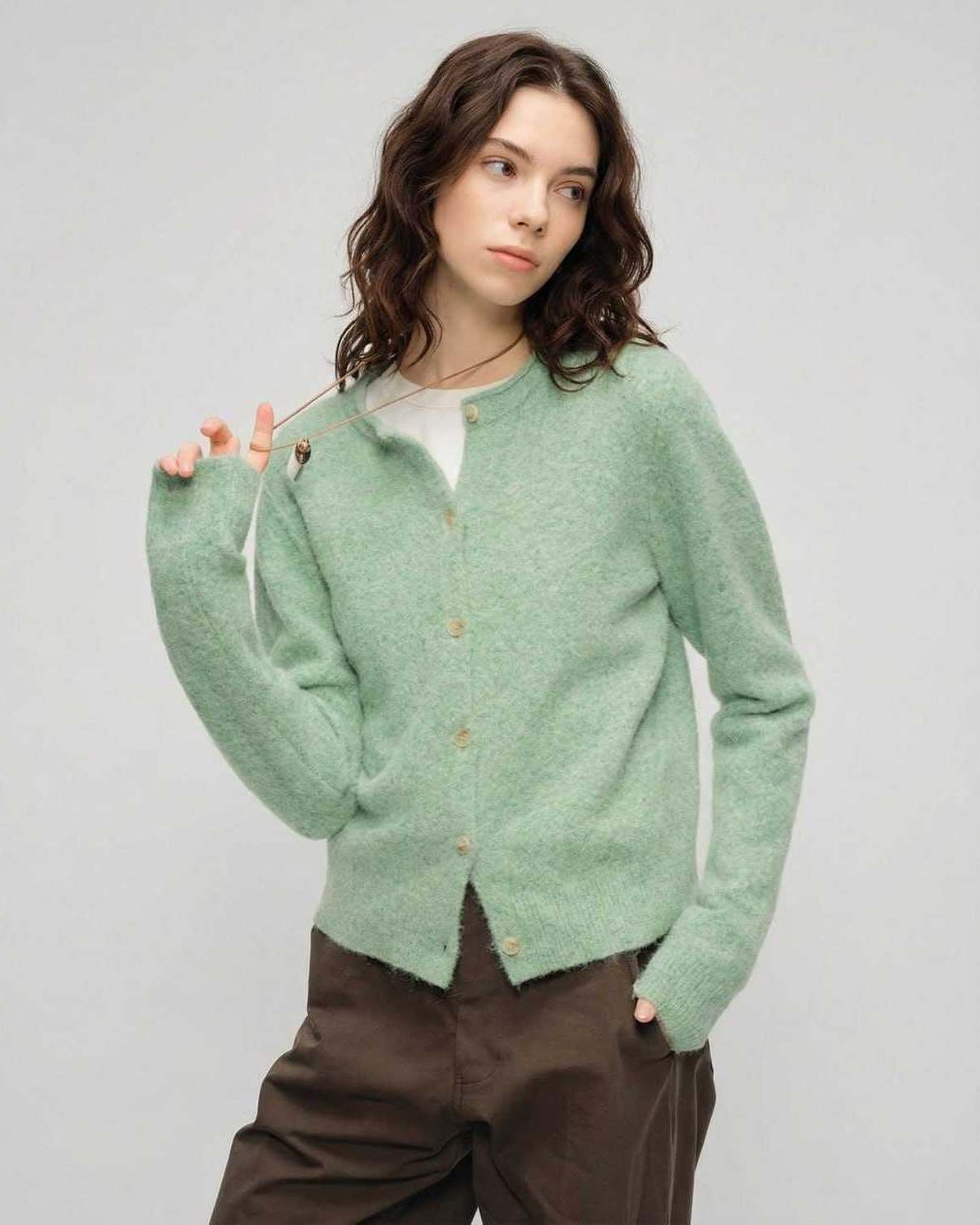 Sage Cardigan by Lauven – Women’s green cardigan sweater with round neck and button front.
