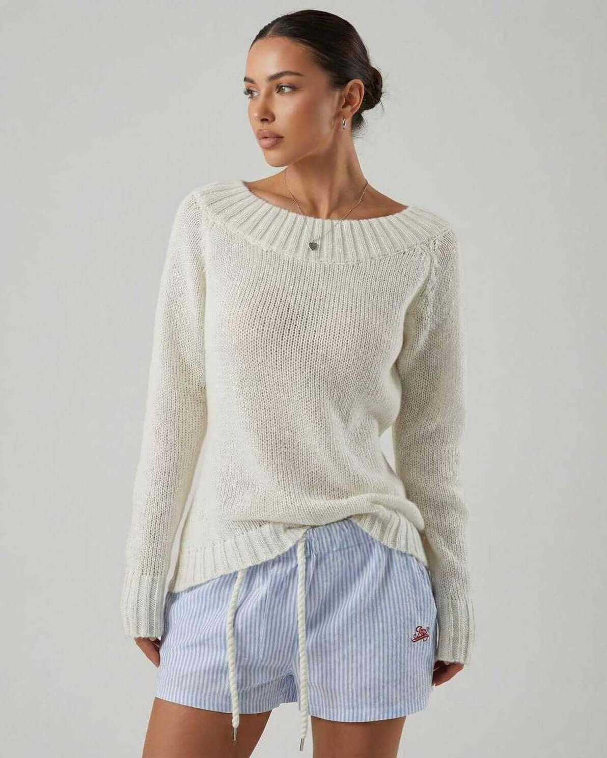 Women wearing the Sienna Sweater by Lauven featuring a boat neck design and relaxed fit.