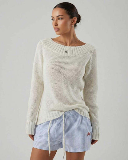 Women wearing the Sienna Sweater by Lauven featuring a boat neck design and relaxed fit.