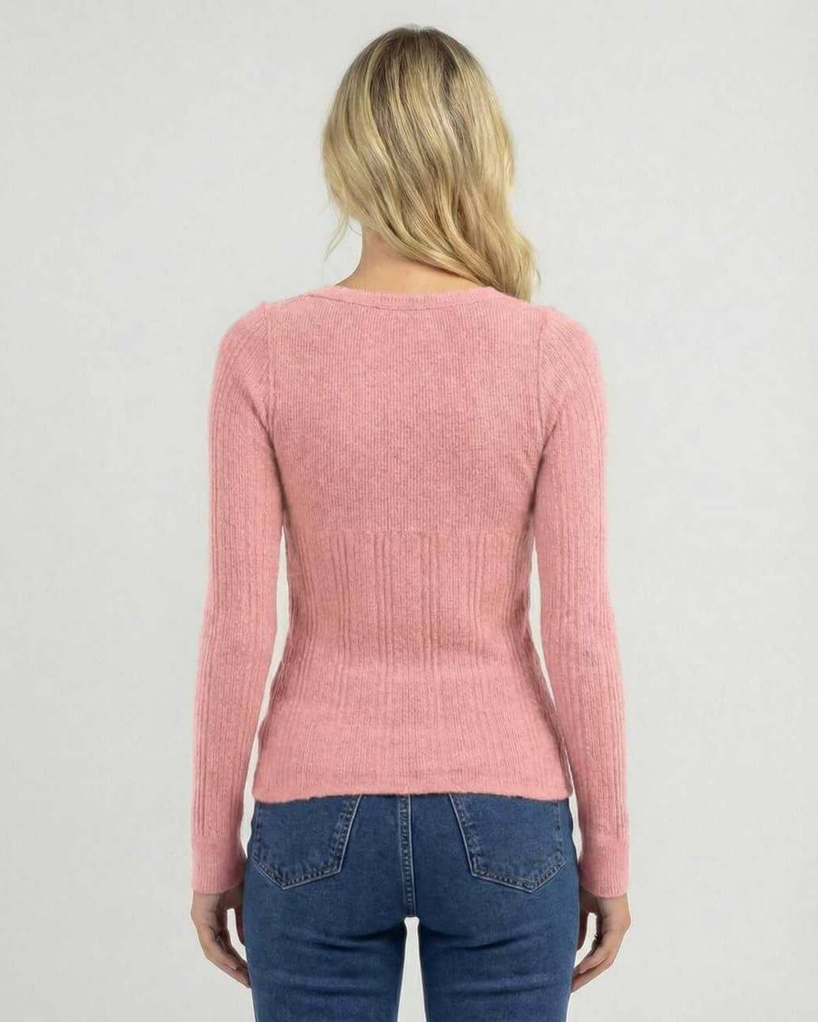 Back view of the Sorrento Long Sleeve - Women's pink ribbed knit shirt from Lauven, showcasing a sleek slim fit.