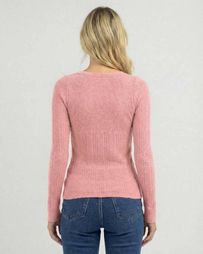 Back view of the Sorrento Long Sleeve - Women's pink ribbed knit shirt from Lauven, showcasing a sleek slim fit.