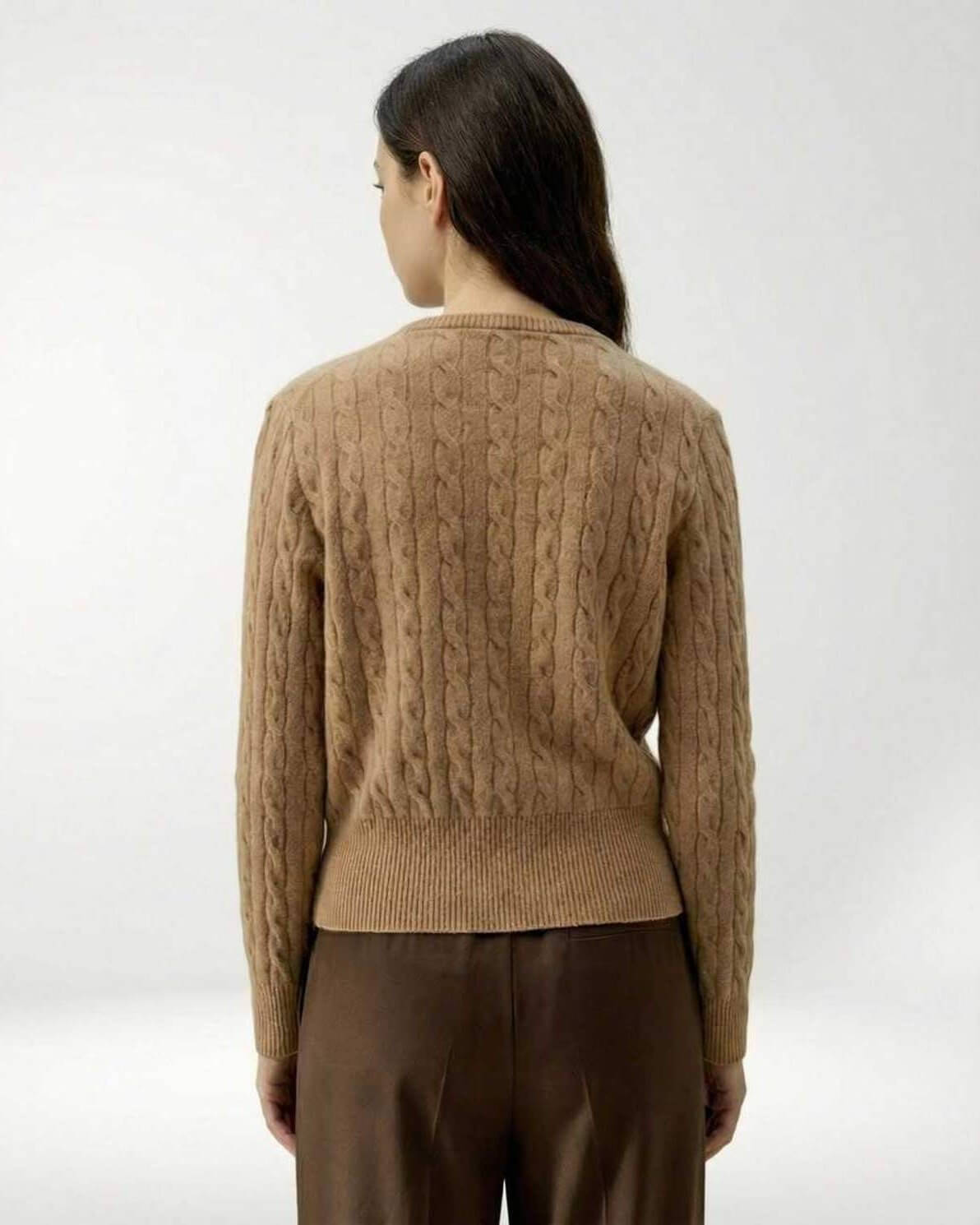 Back view of the Sienna Cardigan by Lauven in soft brown cable knit, showcasing its elegant design.