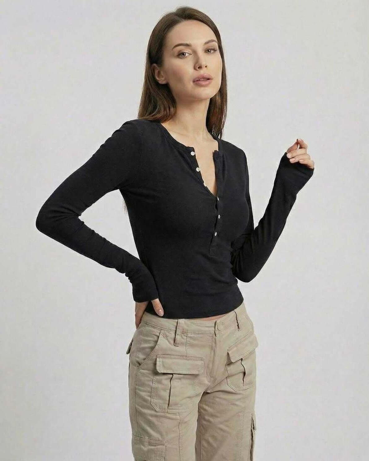 Vega Long Sleeve - Women’s black long sleeve top by Lauven with slim fit viscose design and half-open neckline.