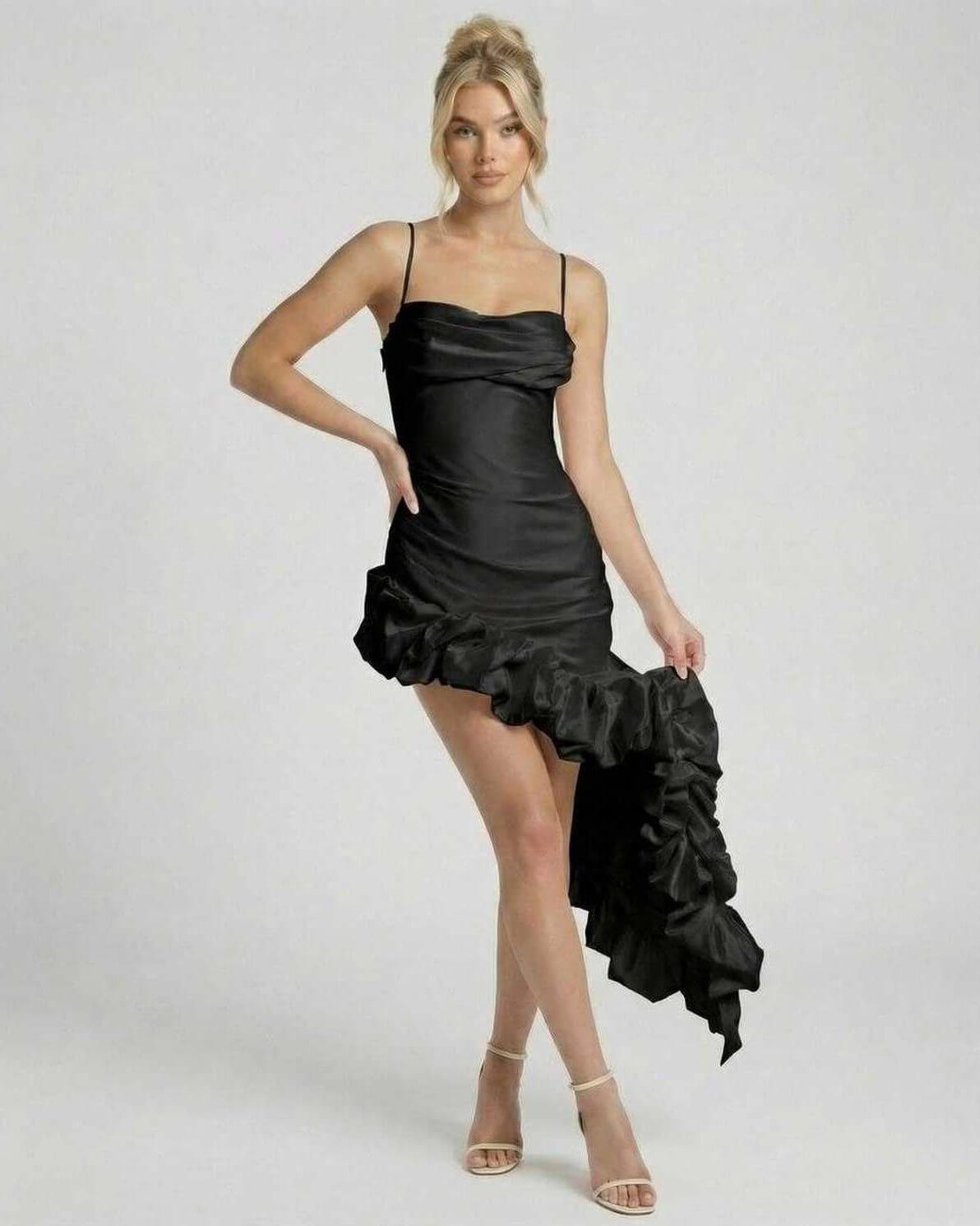 Vesper Midi Dress by Lauven in black satin with dramatic ruffle hem and spaghetti straps.