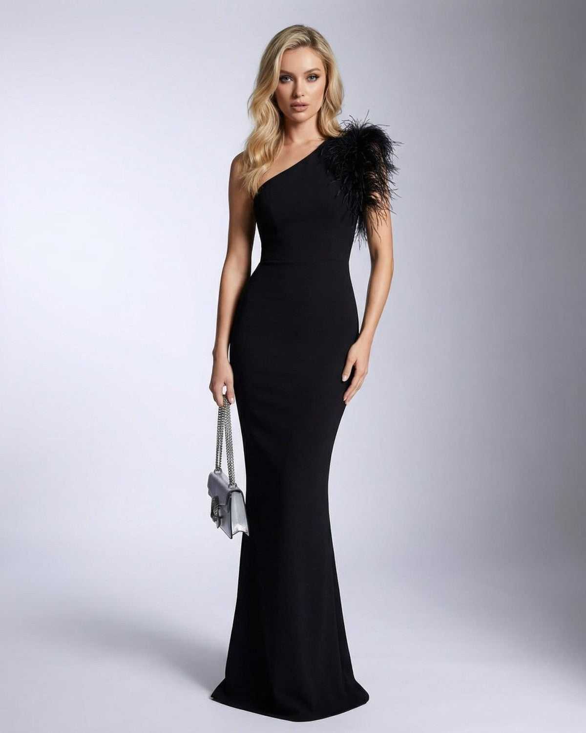 Lauven Noirelle Maxi Dress featuring one shoulder feather detail and mermaid silhouette, elegant evening wear.