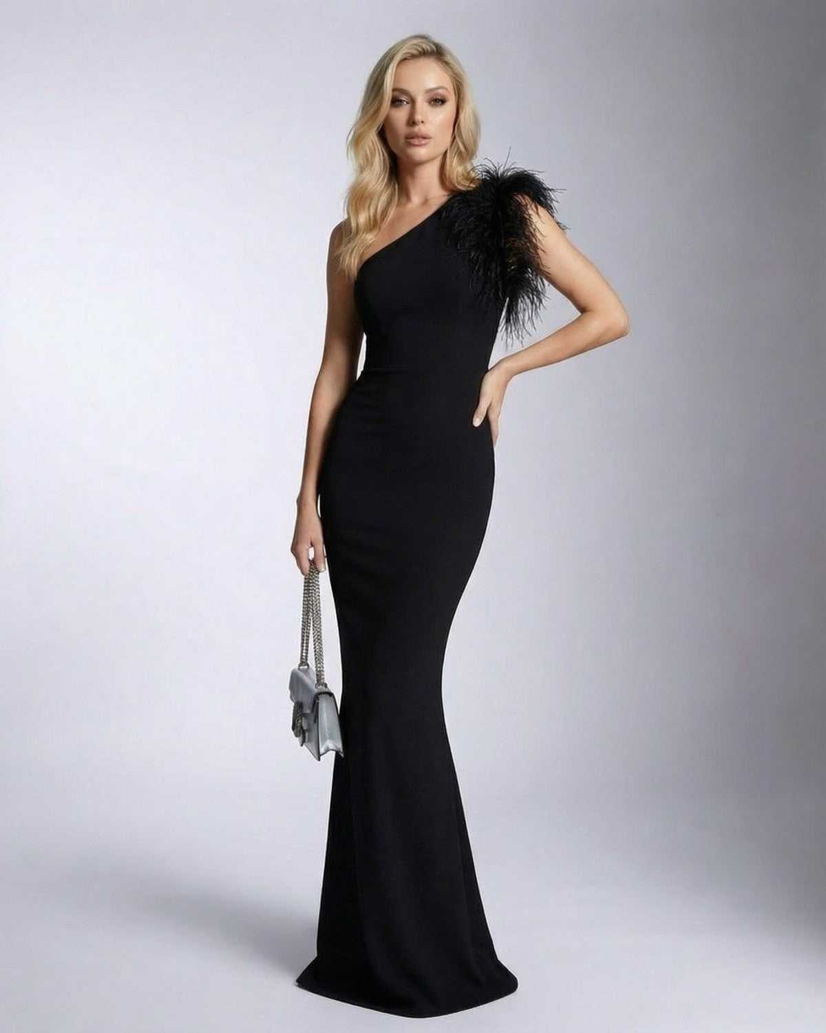 Noirelle Maxi Dress by Lauven, featuring one shoulder feather detail and mermaid silhouette in black.