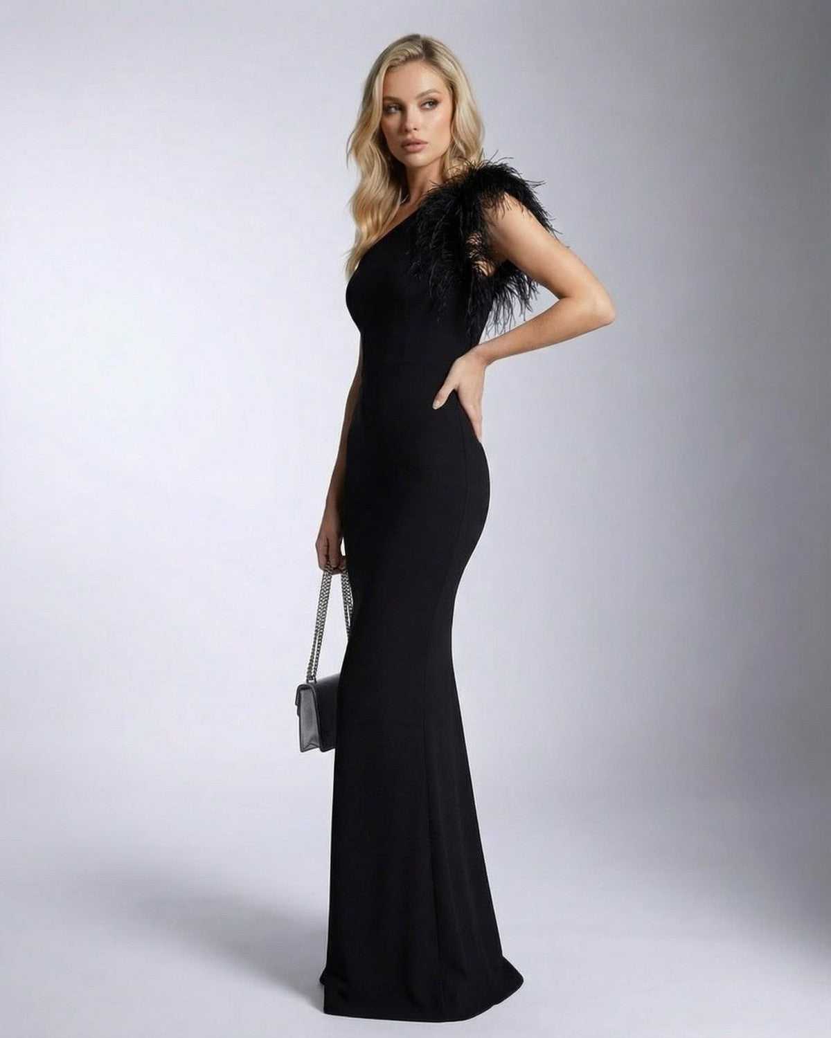 Noirelle Maxi Dress by Lauven, elegant black mermaid gown with one shoulder feather detail.
