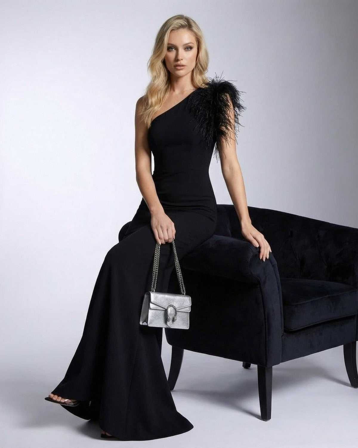 Noirelle Maxi Dress by Lauven, featuring a one shoulder feather detail and mermaid silhouette.