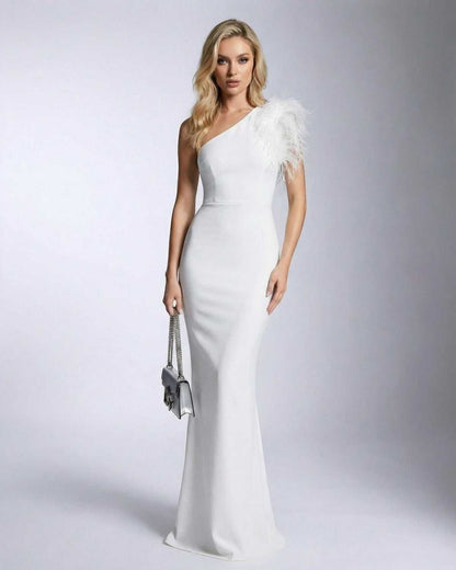 Alessia Maxi Dress by Lauven featuring one shoulder feather detail and mermaid silhouette in white.