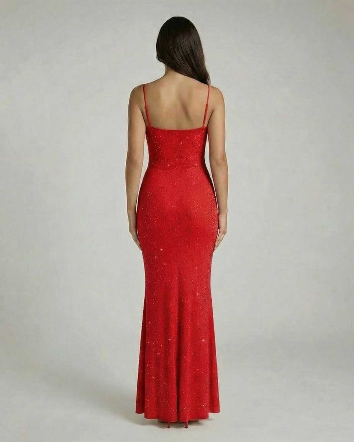 Back view of the Lauven Scarlet Maxi Dress, showing its fitted silhouette and sequin detailing with spaghetti straps.