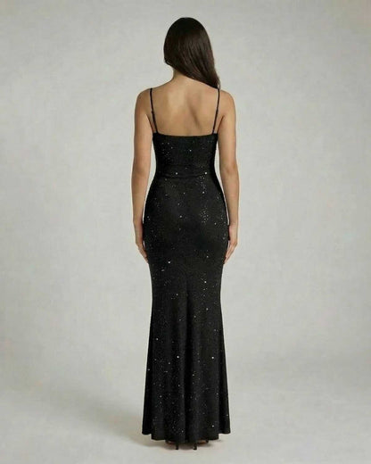 Noir Maxi Dress by Lauven, showcasing a sleek sequin bodycon silhouette with spaghetti straps from the back view.