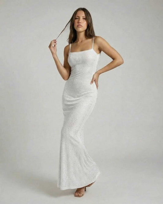 Ivory Maxi Dress by Lauven, a sequined bodycon maxi with spaghetti straps, showcasing an elegant silhouette.