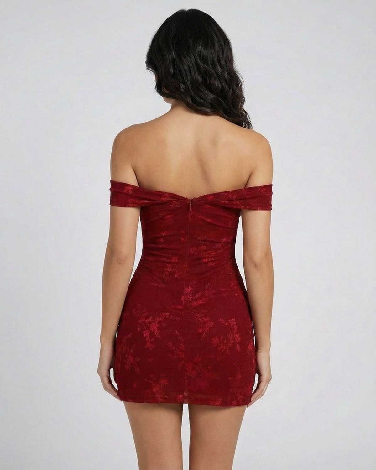 Back view of the Verona Mini Dress by Lauven, showcasing its elegant jacquard fabric and off-the-shoulder design.