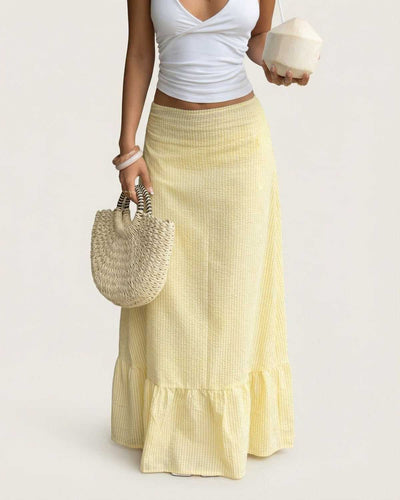 Solara Maxi Skirt by Lauven in soft yellow with flared silhouette and subtle striped texture
