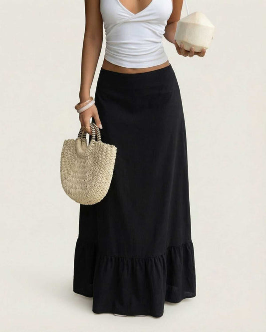 Noir Maxi Skirt by Lauven, showcasing a flared silhouette and textured stripe finish, perfect for a sophisticated look.