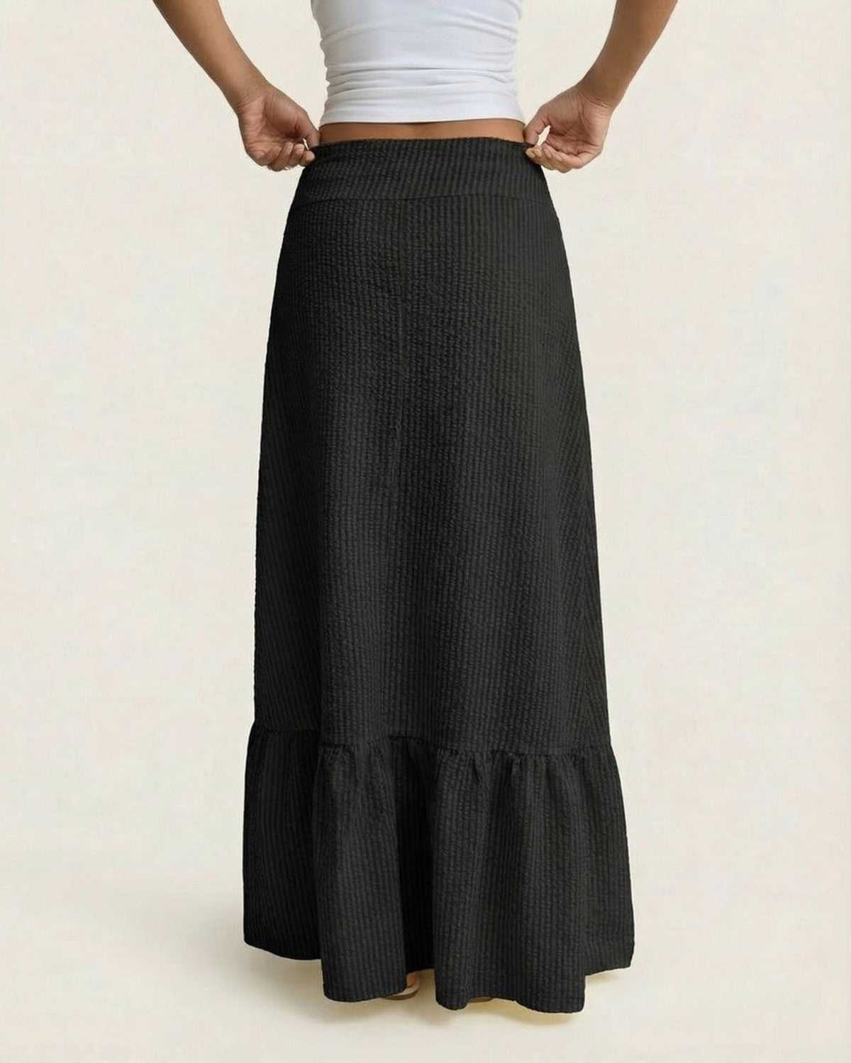 Noir Maxi Skirt by Lauven, showcasing a flared silhouette and textured stripe finish for elegant style.