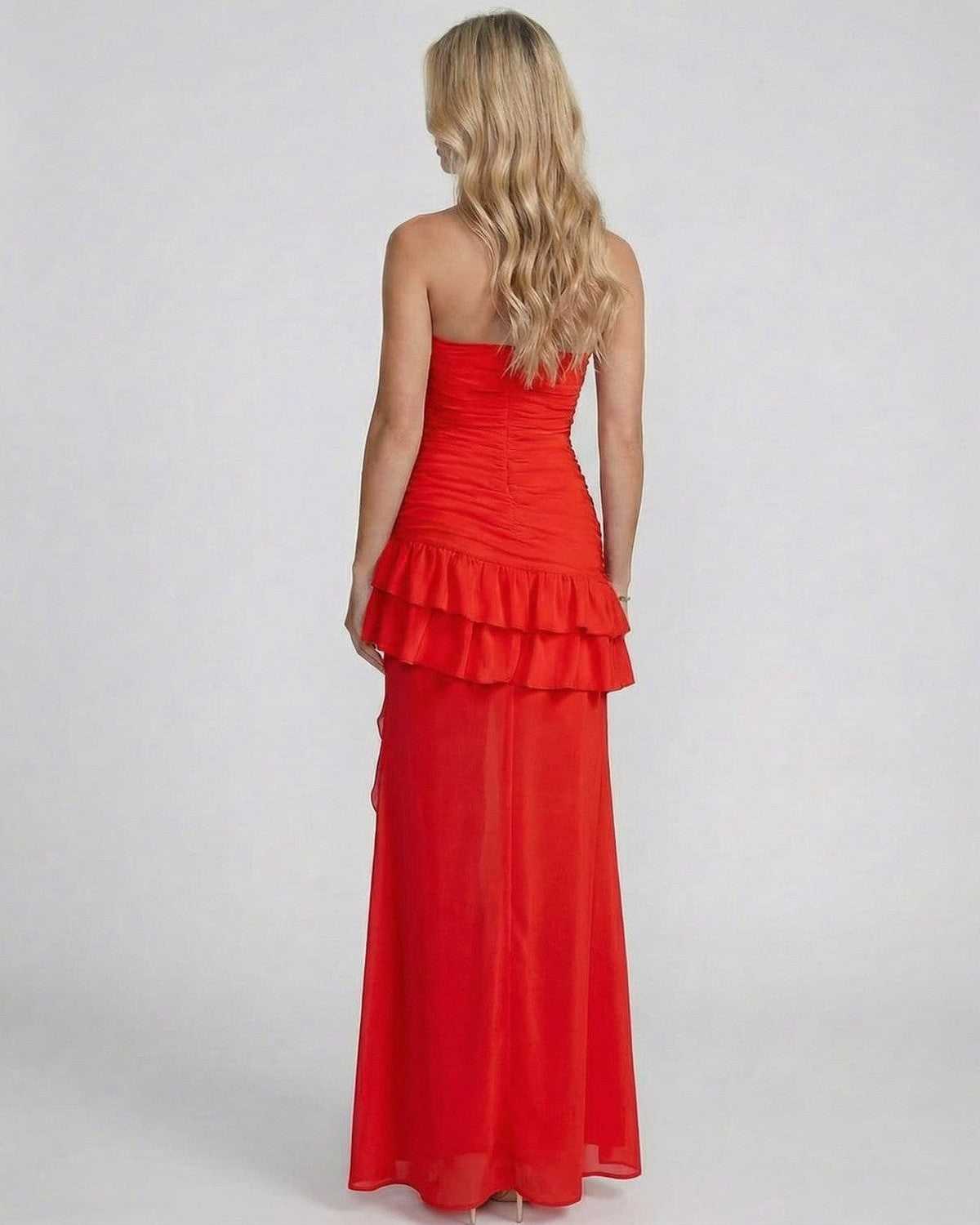 Valencia Maxi Dress by Lauven, showcasing a back view with layered ruffles and ruching in bold red.