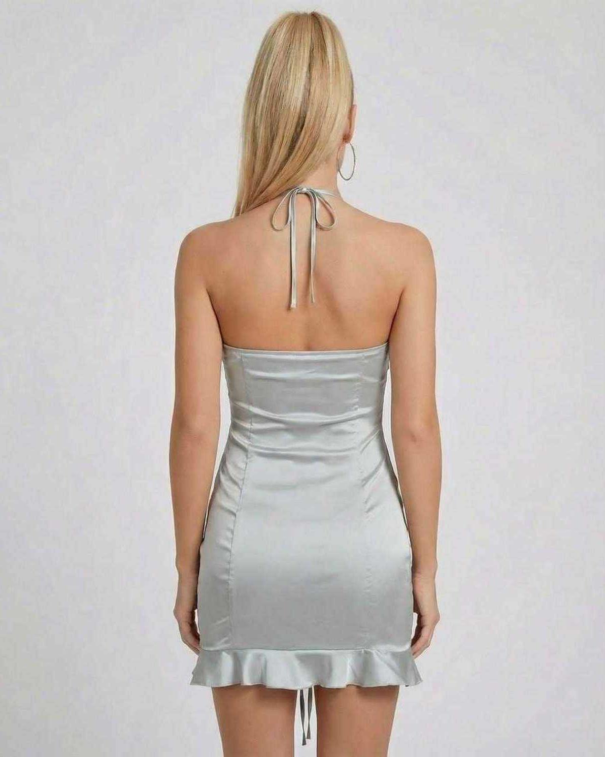 Celeste Mini Dress by Lauven, showing the back view with sleek satin finish and ruched detailing.