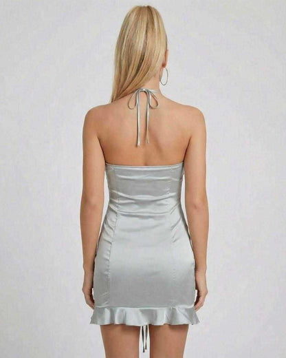 Celeste Mini Dress by Lauven, showing the back view with sleek satin finish and ruched detailing.