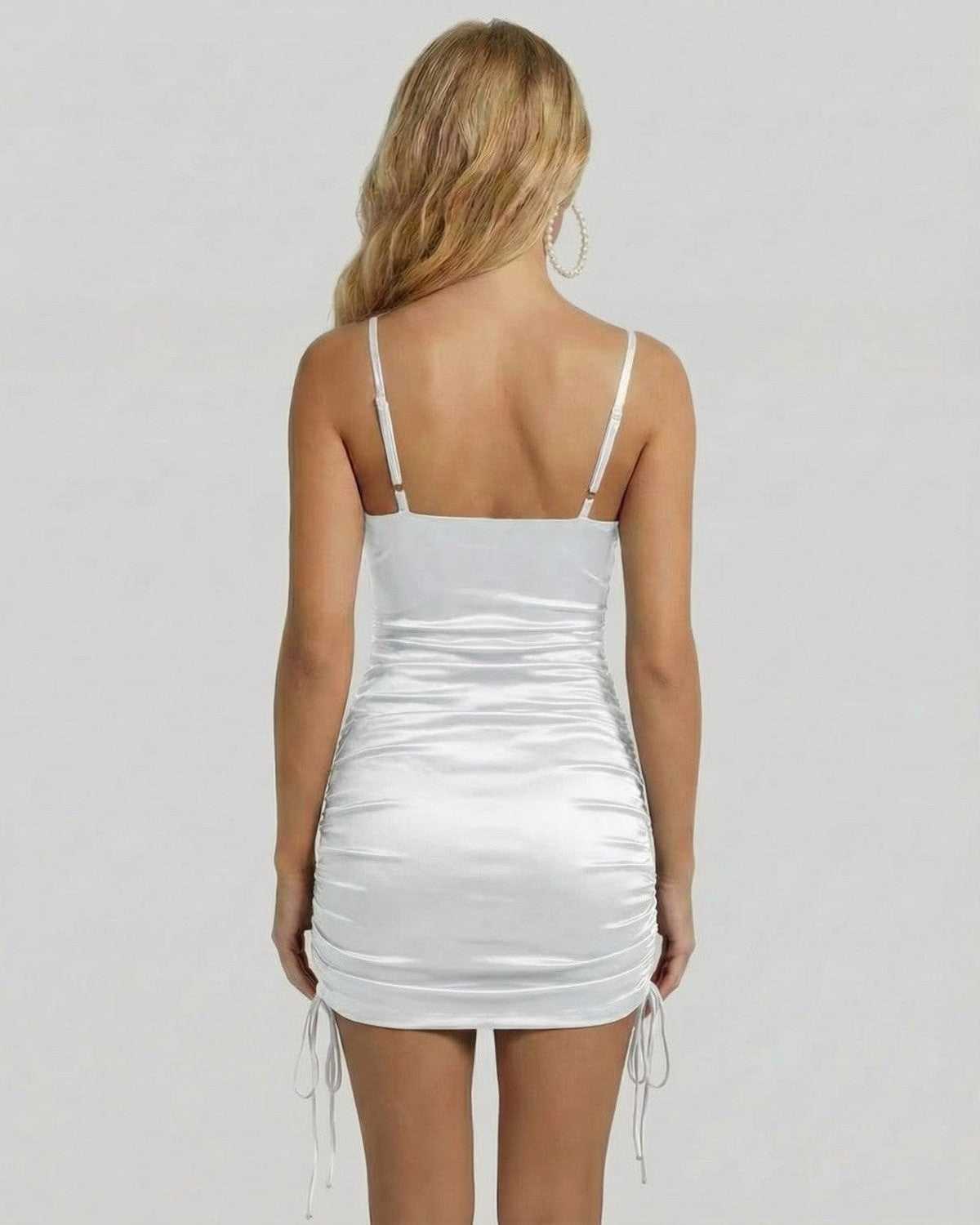 Bianca Mini Dress by Lauven, showcasing a satin finish and ruched sides from the back view.