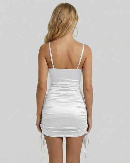 Bianca Mini Dress by Lauven, showcasing a satin finish and ruched sides from the back view.
