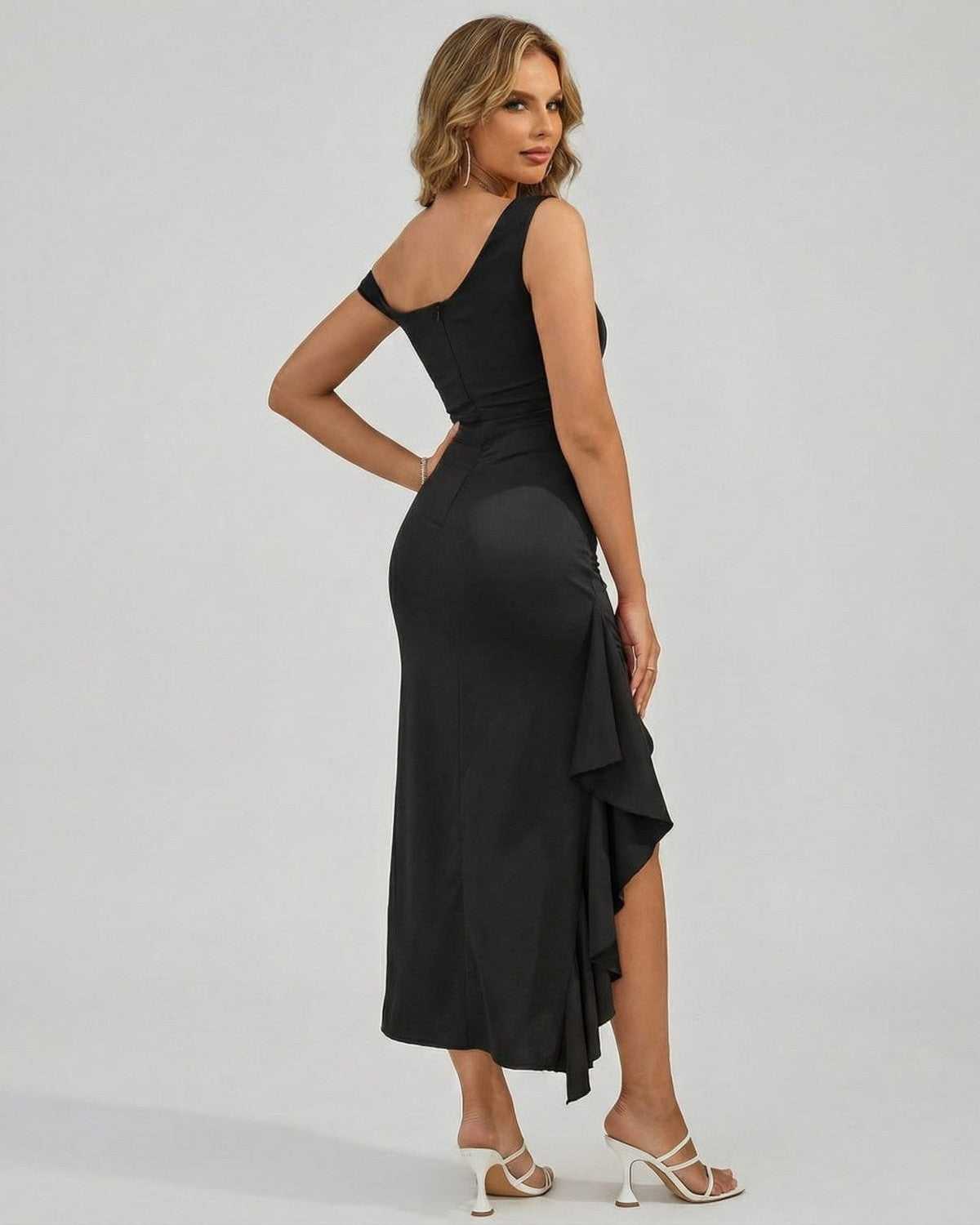 Noiré Midi Dress in black from Lauven, featuring an off-the-shoulder design and a stylish ruffle for elegant sophistication.