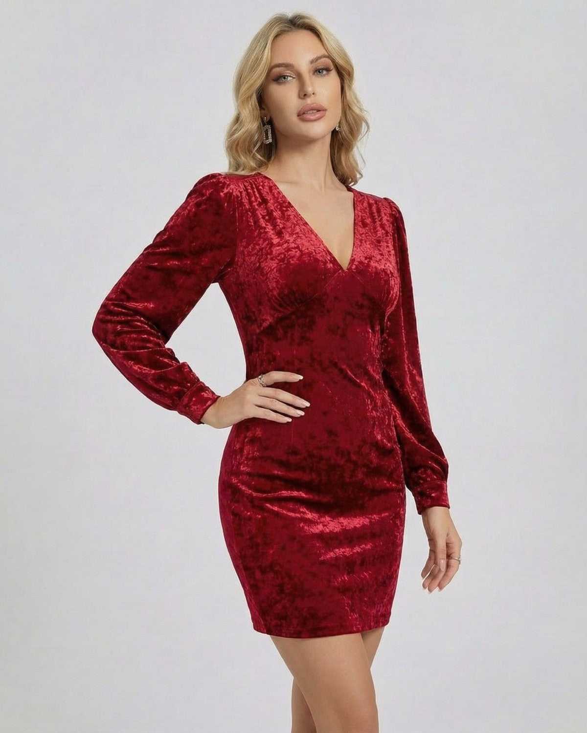 Valencia Mini Dress by Lauven in red velvet, featuring long sleeves and a classic V-neckline.
