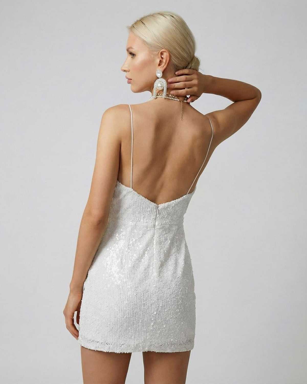 Lunaria Mini Dress by Lauven featuring a sleek back view with sequins and a draped design.