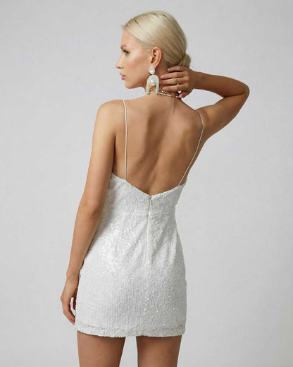 Lunaria Mini Dress by Lauven featuring a sleek back view with sequins and a draped design.