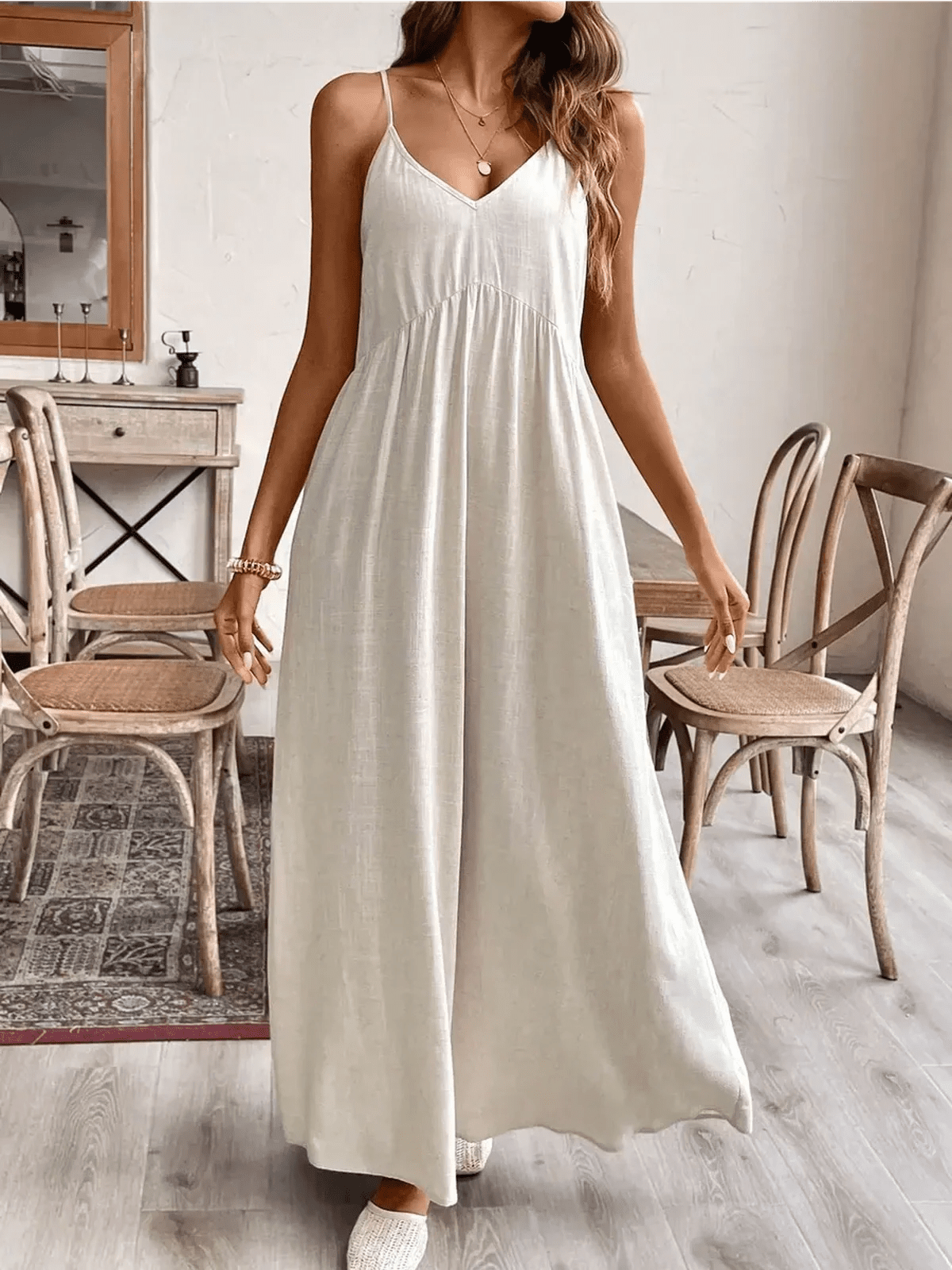 Serenity Maxi Dress in light fabric, featuring a V-neckline and tie-back detail, perfect for summer elegance.