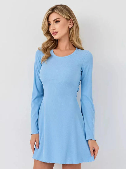 Pastel blue ribbed knit mini dress with long fluted sleeves and flared hem, perfect for summer celebrations.