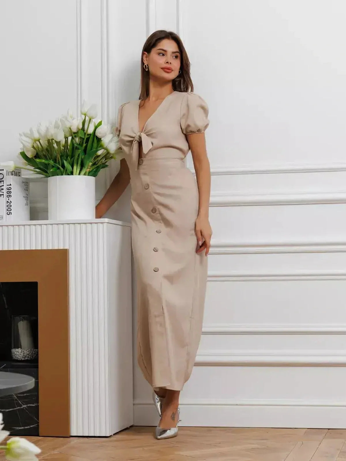 Serene Bond Maxi Dress featuring refined puff sleeves and waist tie in soft neutral hue, perfect for warm-weather elegance.
