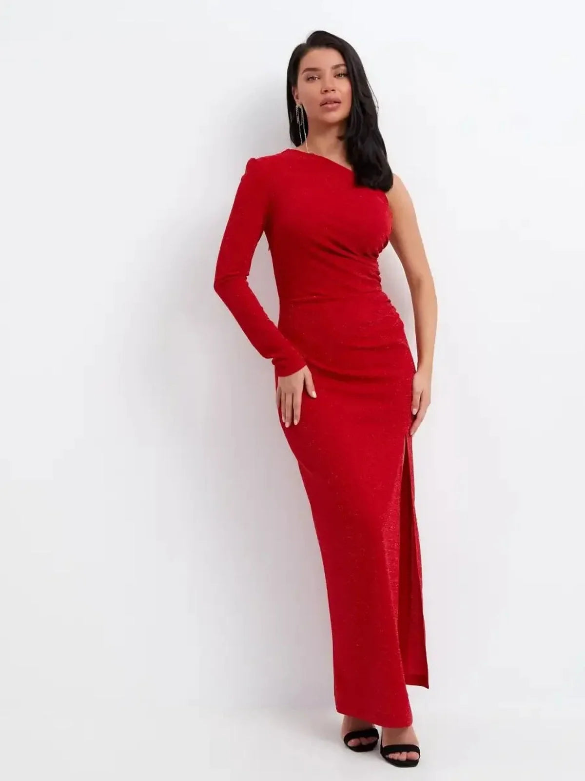 Stunning red one-shoulder maxi dress with thigh-high slit and gathered waist, perfect for evening glamour.
