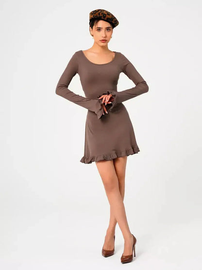 Mocha Flare ribbed knit mini dress with flared cuffs and ruffled hem, perfect for transitional summer styling.