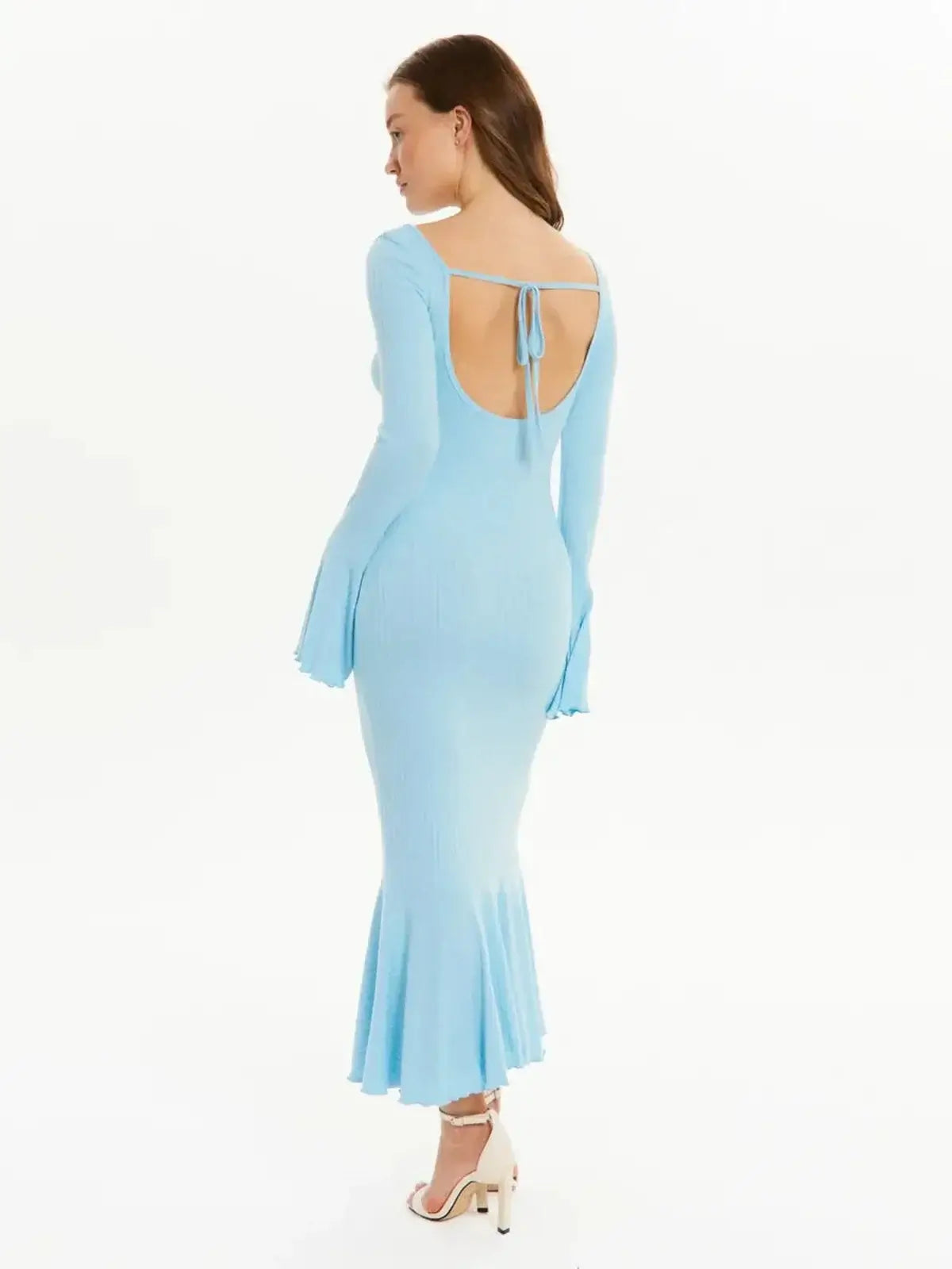 Light blue long sleeve midi dress with flared hem and dramatic sleeves, perfect for wedding guest or formal occasions.
