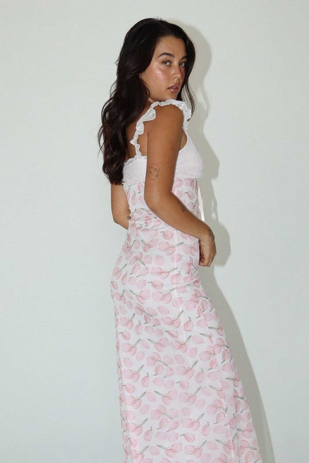 Elegant pink floral maxi dress with lace detailing, perfect for summer events, weddings, and formal occasions.