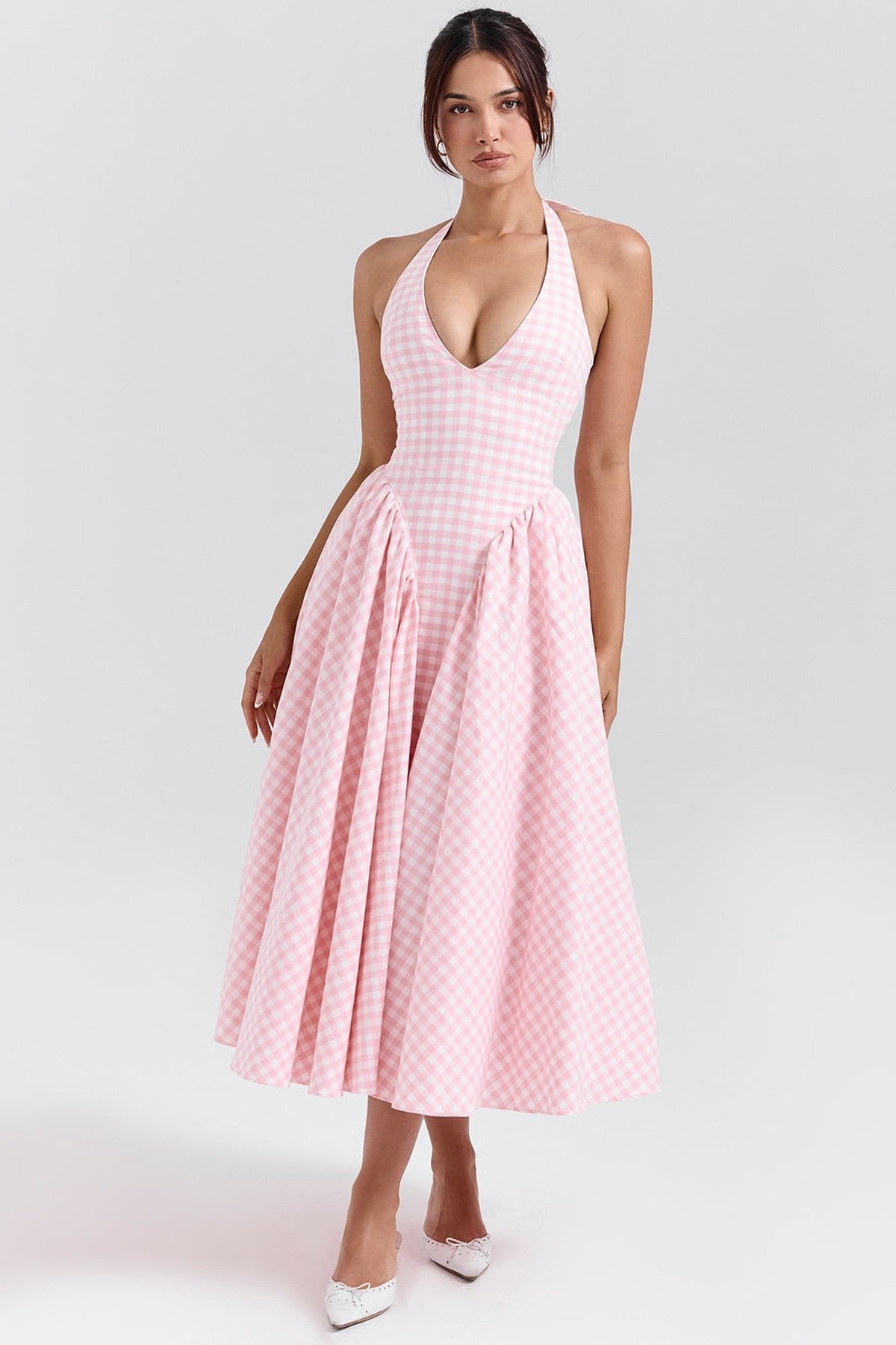 Pink gingham maxi dress with halter neckline, perfect for summer parties and weddings.