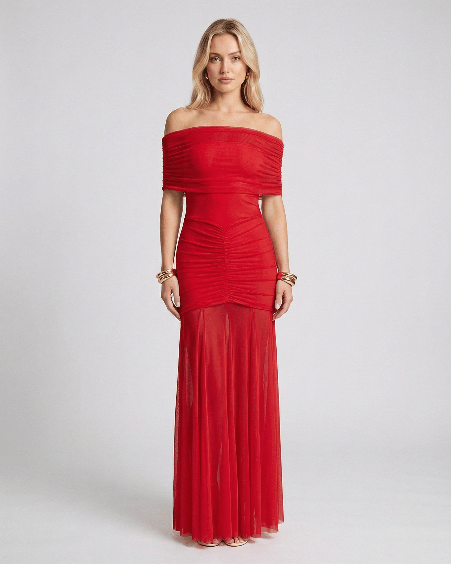 Lauven Noirline Maxi Dress featuring off-shoulder neckline, ruched bodice, and flowing sheer skirt for elegant movement.