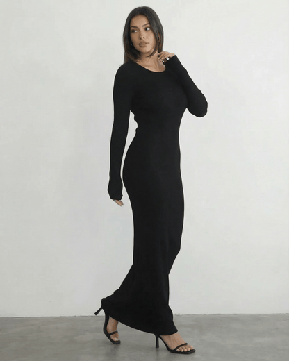 Nyx Maxi Dress by Lauven - Long sleeve black maxi dress with open back detail, showcasing its sleek silhouette.