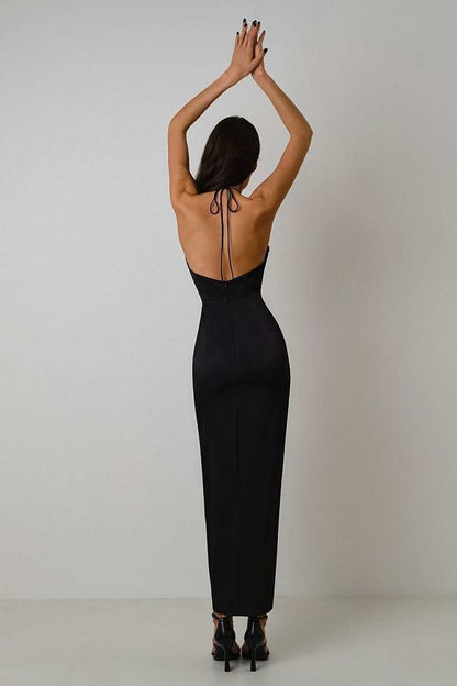 Elegant black satin maxi dress with tie-back detail, perfect for formal occasions and evening events.