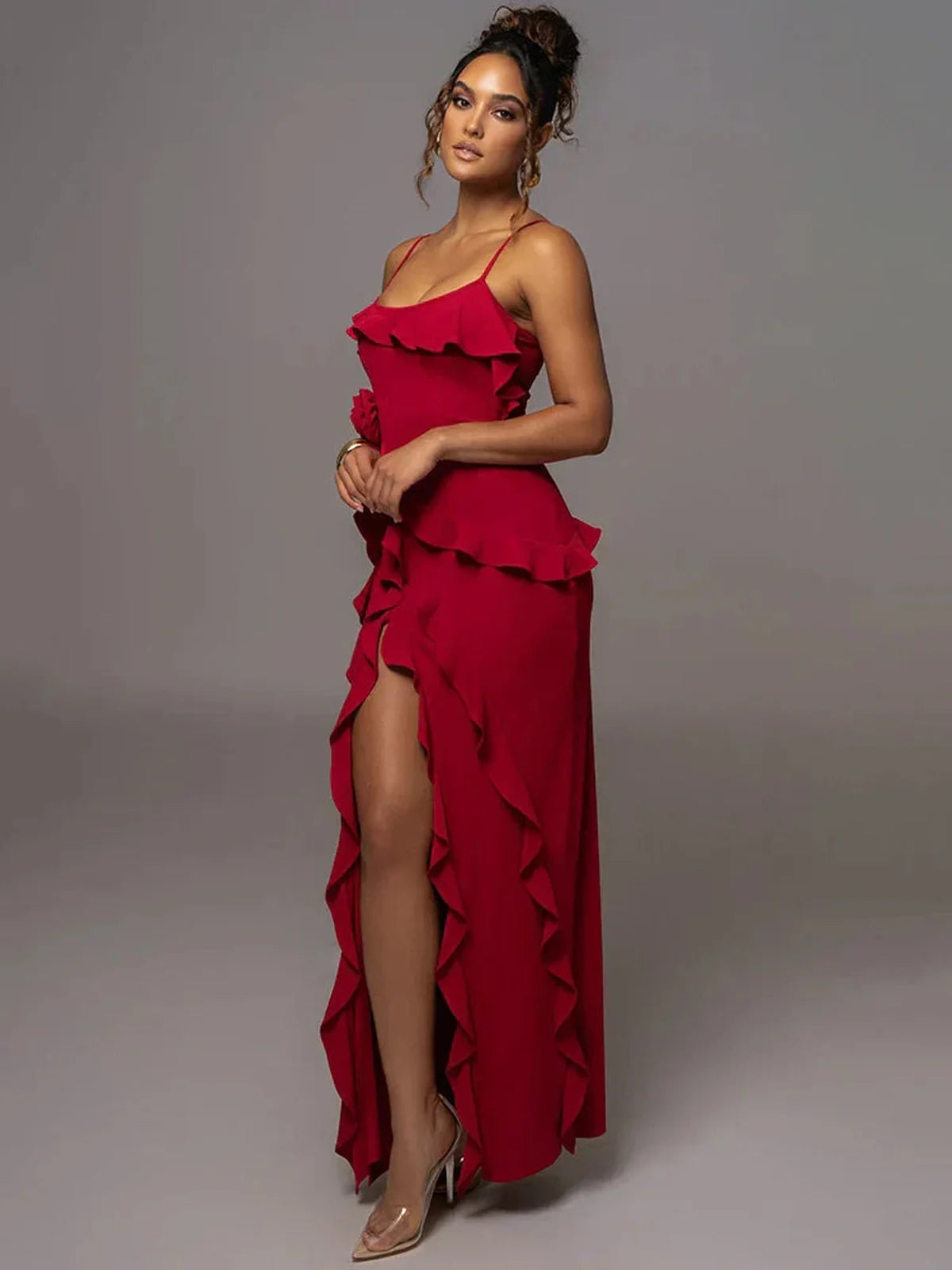 Elegant red Aurora Maxi Dress with cascading ruffles and thigh-high slit, perfect for special occasions.